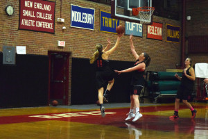 First-year Erika Lamere rises for a layup as the Bobcats practice in Alumni Gym. John Neufeld/The Bates Student