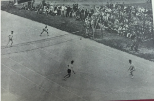 The baseball team plays on Garcelon Field, with Roger Williams Hall in the distance. (Muskie Archives/Courtesy Photo)