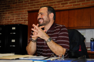 New athletic director Jason Fein smiles as he remembers his arrival to Bates. MADDY SMITH/THE BATES STUDENT