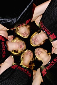 Senior members of the women’s basketball team huddle during practice. OLIVIA GILBERT/THE BATES STUDENT.